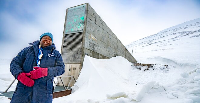 Patrick Kasasa of the Zimbabwe-based Community Technology Development Trust stands in front of the Svalbard Global Seed Vault after an emotional seed deposit ceremony. Photo: Mike Major/Crop Trust
